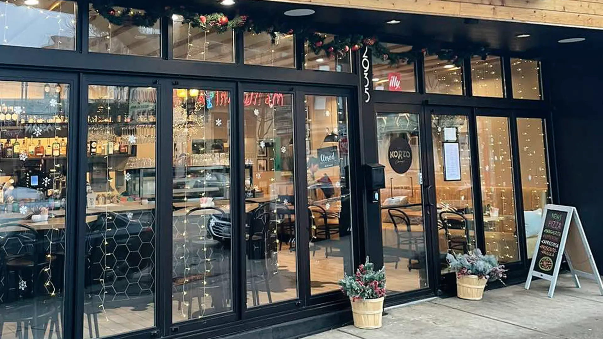 Café Korzo storefront and entrance on Broadway